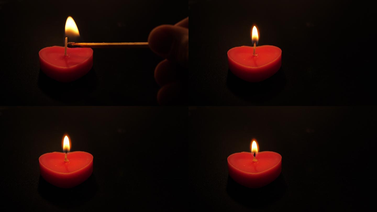 在情人节点燃一支心形蜡烛