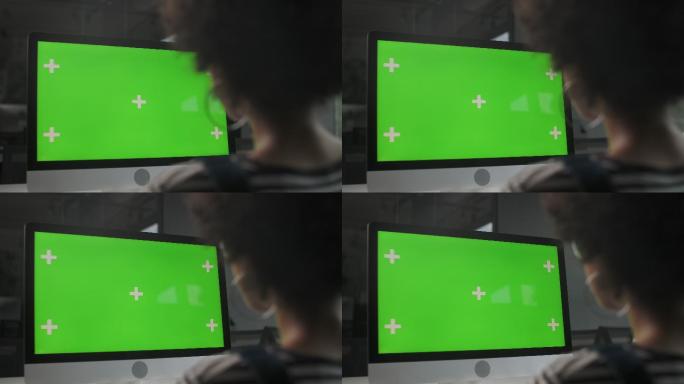 绿色屏幕的电脑商务人员使用电脑屏幕可抠图