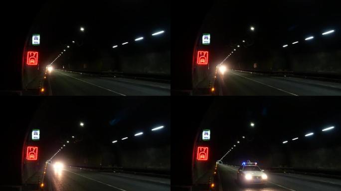 高速公路隧道内路政车辆驶过警灯闪烁