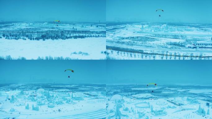 滑翔伞飞越冰雪中的哈尔滨职工水上运动中心