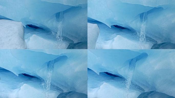 冰洞的内部山涧流水水花飞溅冰川冰雪融化温