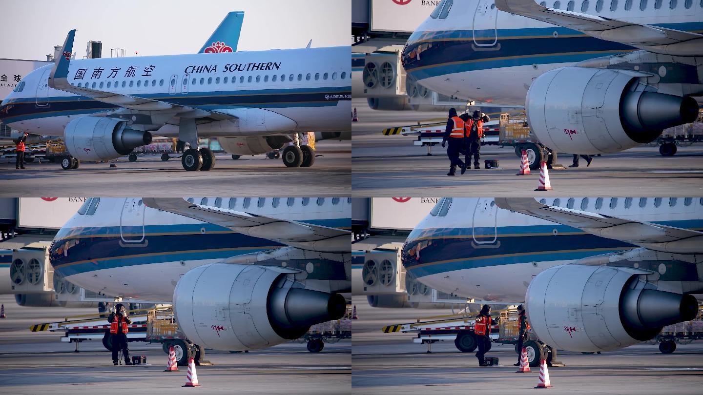 中国南方航空公司客机在机场降落与检查