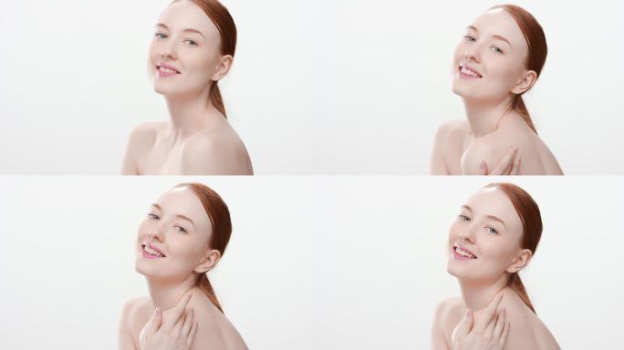 年轻女子微笑着抚摸着肩膀