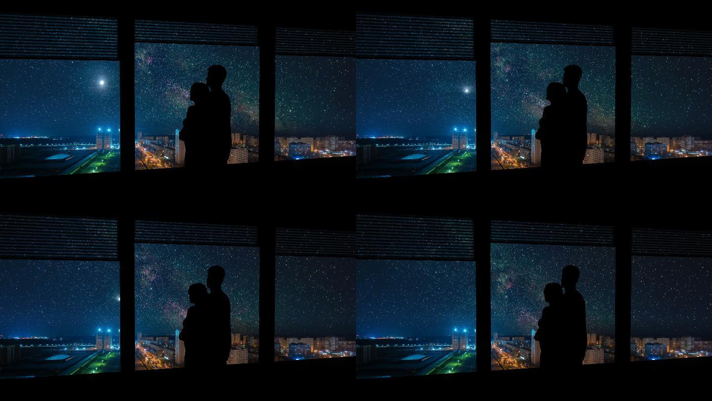 城市的夜景剪影身影背影眺望远望仰望星空