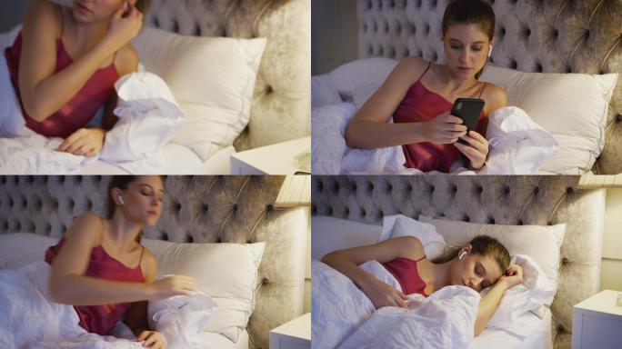 睡觉前，妇女戴上连接手机的无线耳机