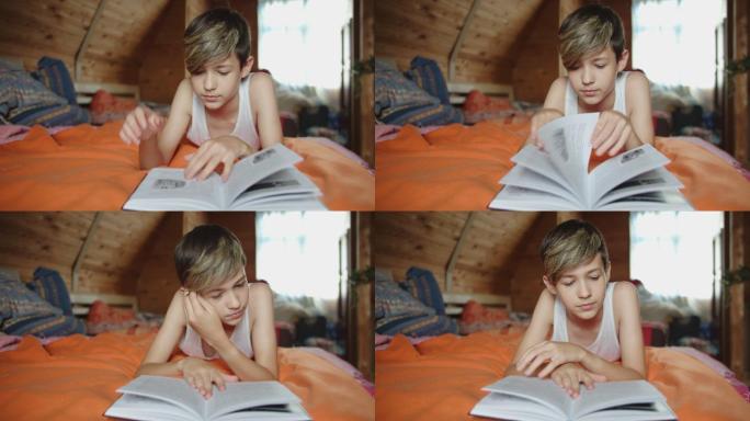少年躺在床上，在室内看书