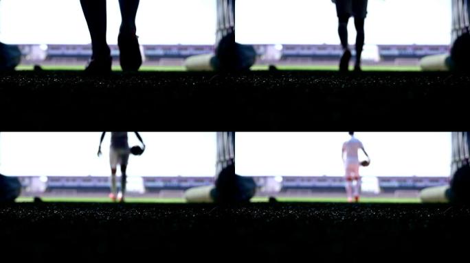 足球运动员走向体育场的剪影