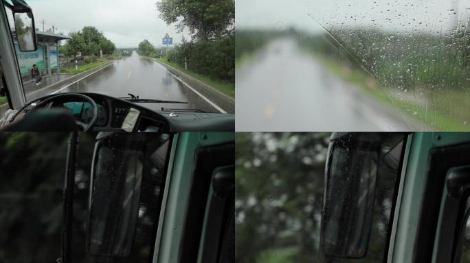 雨中 大巴车开在乡间的小路上