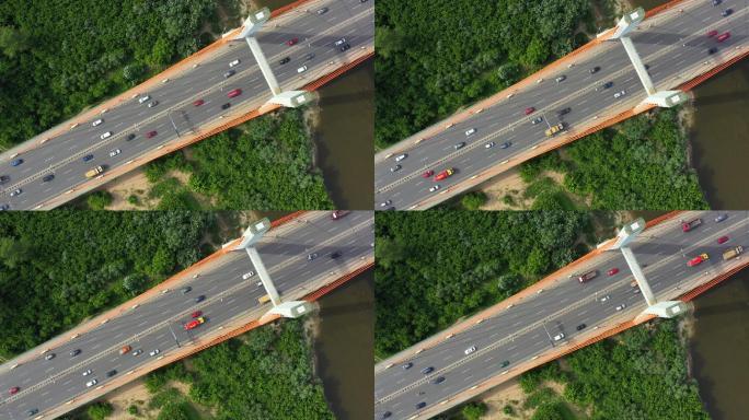 汽车在公路桥上行驶的无人机视图