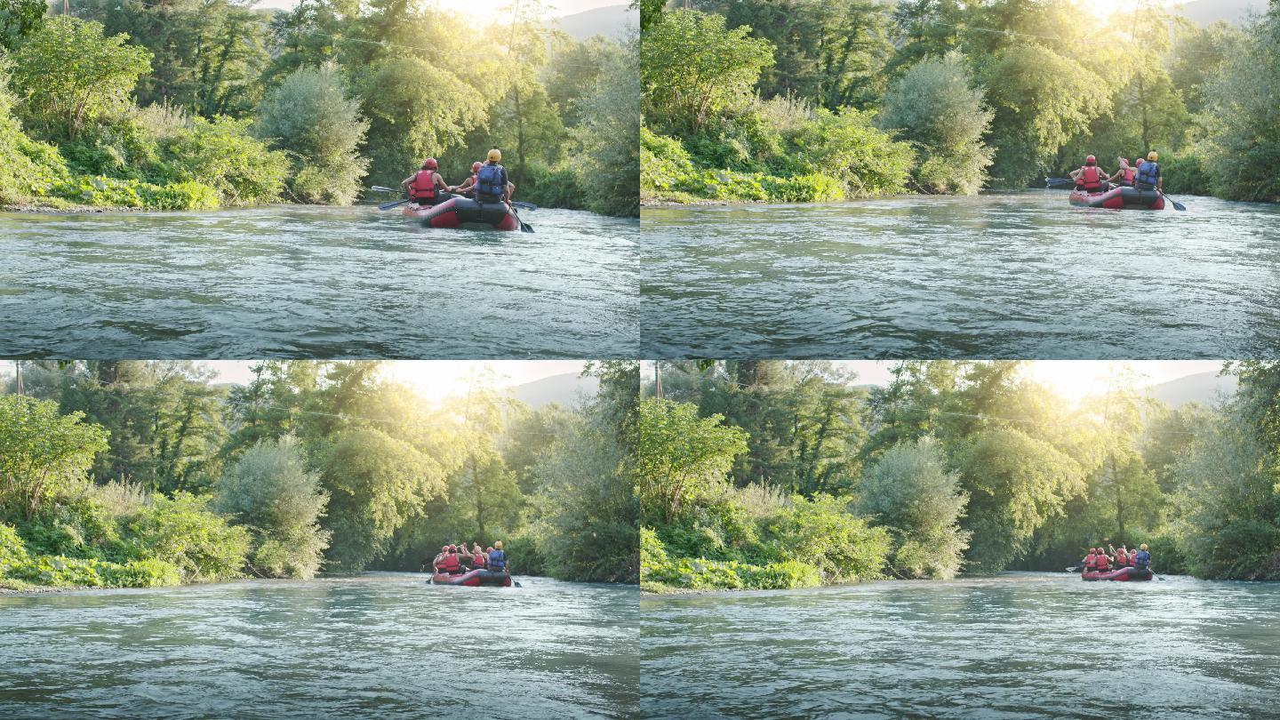 一群人坐在橡皮艇上在河上漂流