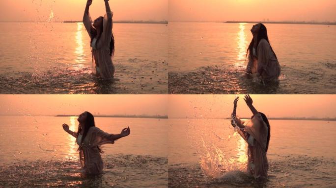 女孩站在水面上挥舞着双手，心情很好。