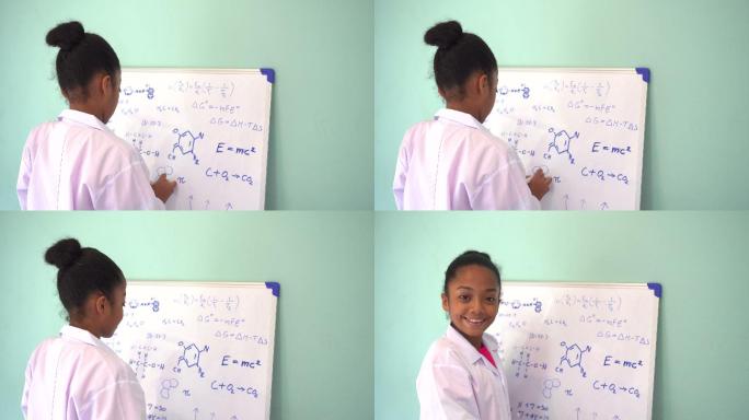 女孩在白板上写数学和科学公式
