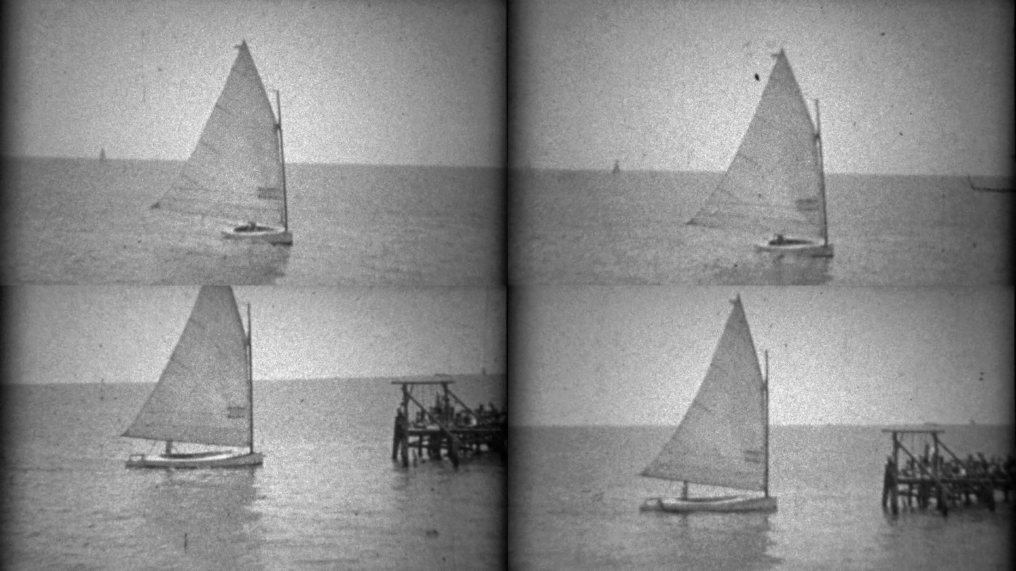 1934年，一艘单人帆船驶入码头。