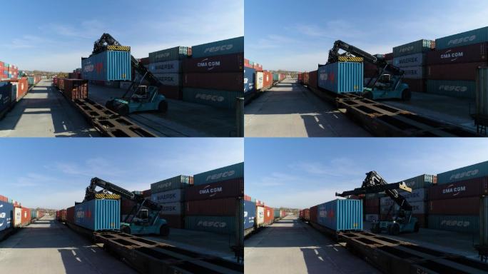 集装箱装卸工在港口码头上装载集装箱。