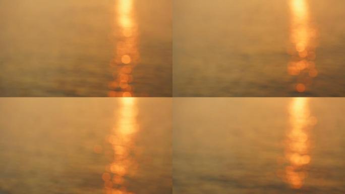 美丽的暗金色海水海面湖面大江大河夕阳光斑