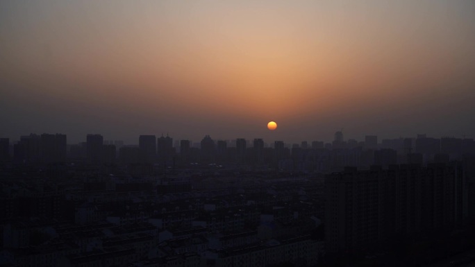 城市夕阳太阳落山黄昏日落延时