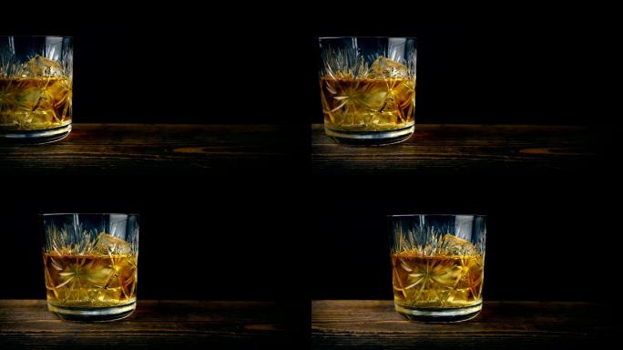 桌上有一杯威士忌玻璃杯实拍视频特写镜头