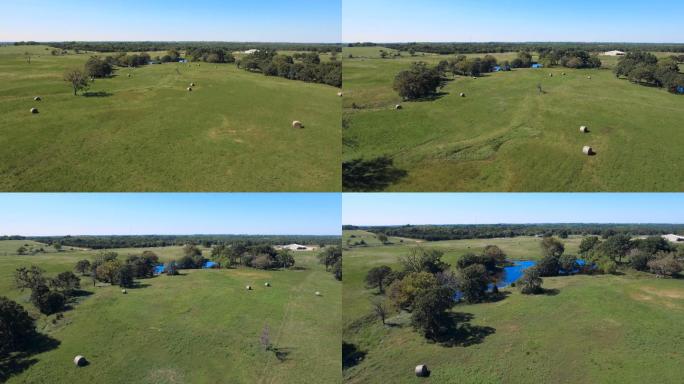 农村牧场干草捆和水的鸟瞰图