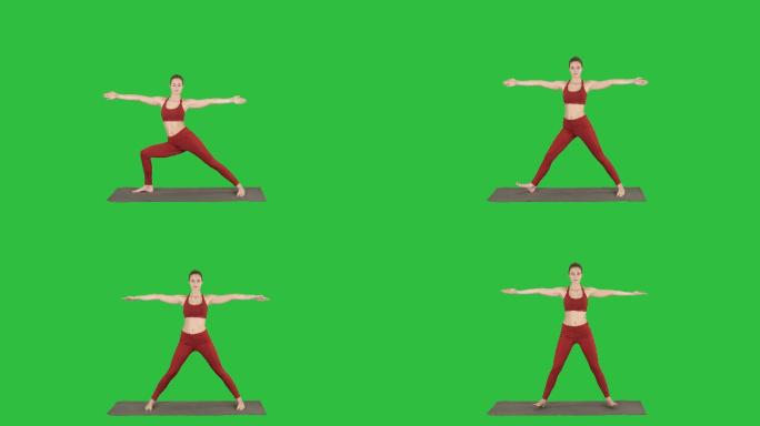 运动型年轻女性在绿色屏幕上练习瑜伽