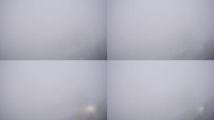 浓雾中的汽车大雾天气恶劣天气弥漫雾气