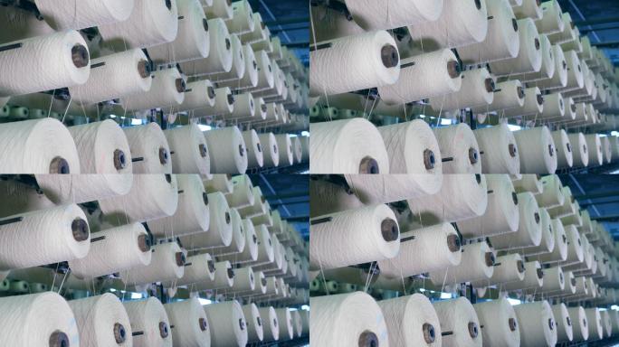 工业纺织厂。流水线机械化织布机