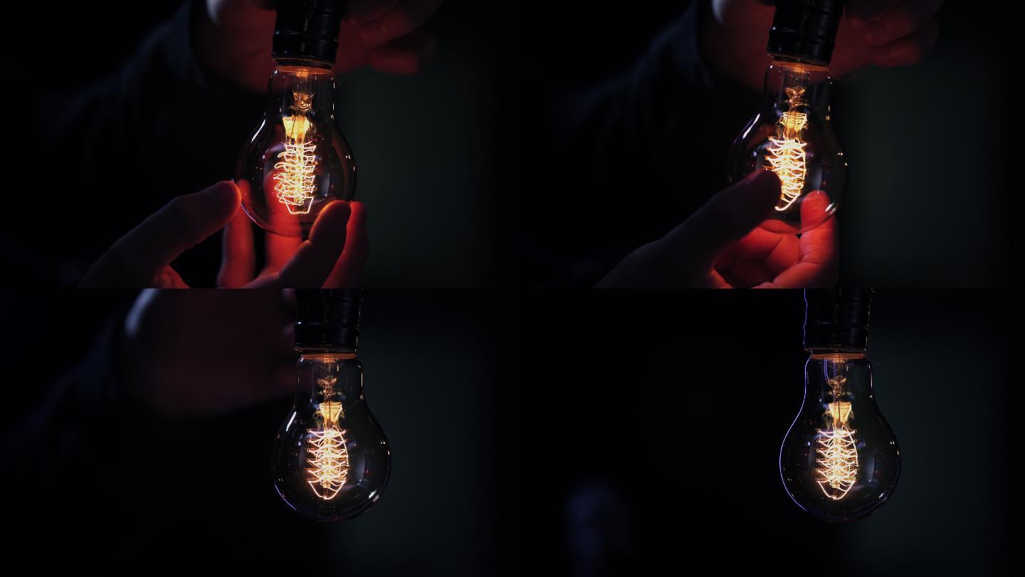发光的灯泡钨丝灯特写光明发明