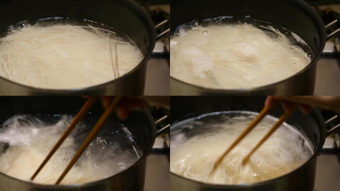 一段在沸水锅里煮面条的视频。