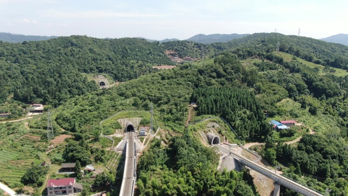 航拍高铁轨道穿山隧道