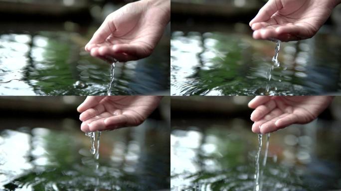 用手触摸寒冷的水。