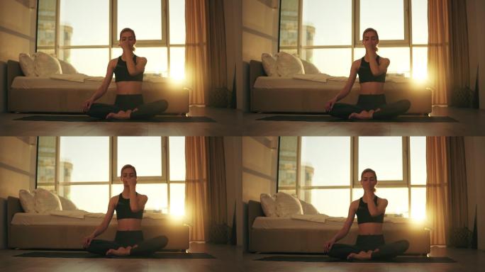 女子练习瑜伽冥想解压品质生活