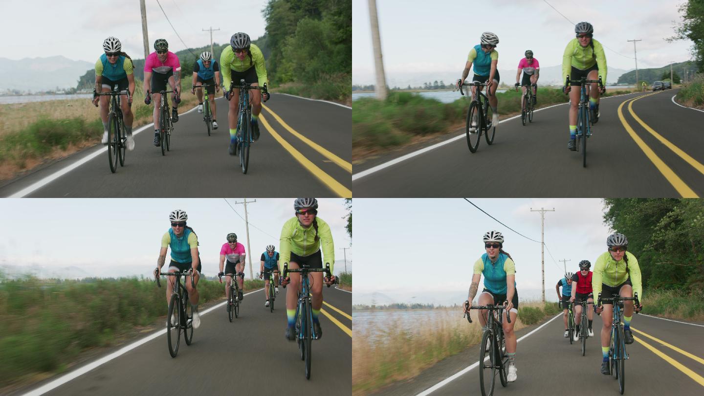乡村公路上一群自行车手的追踪镜头。