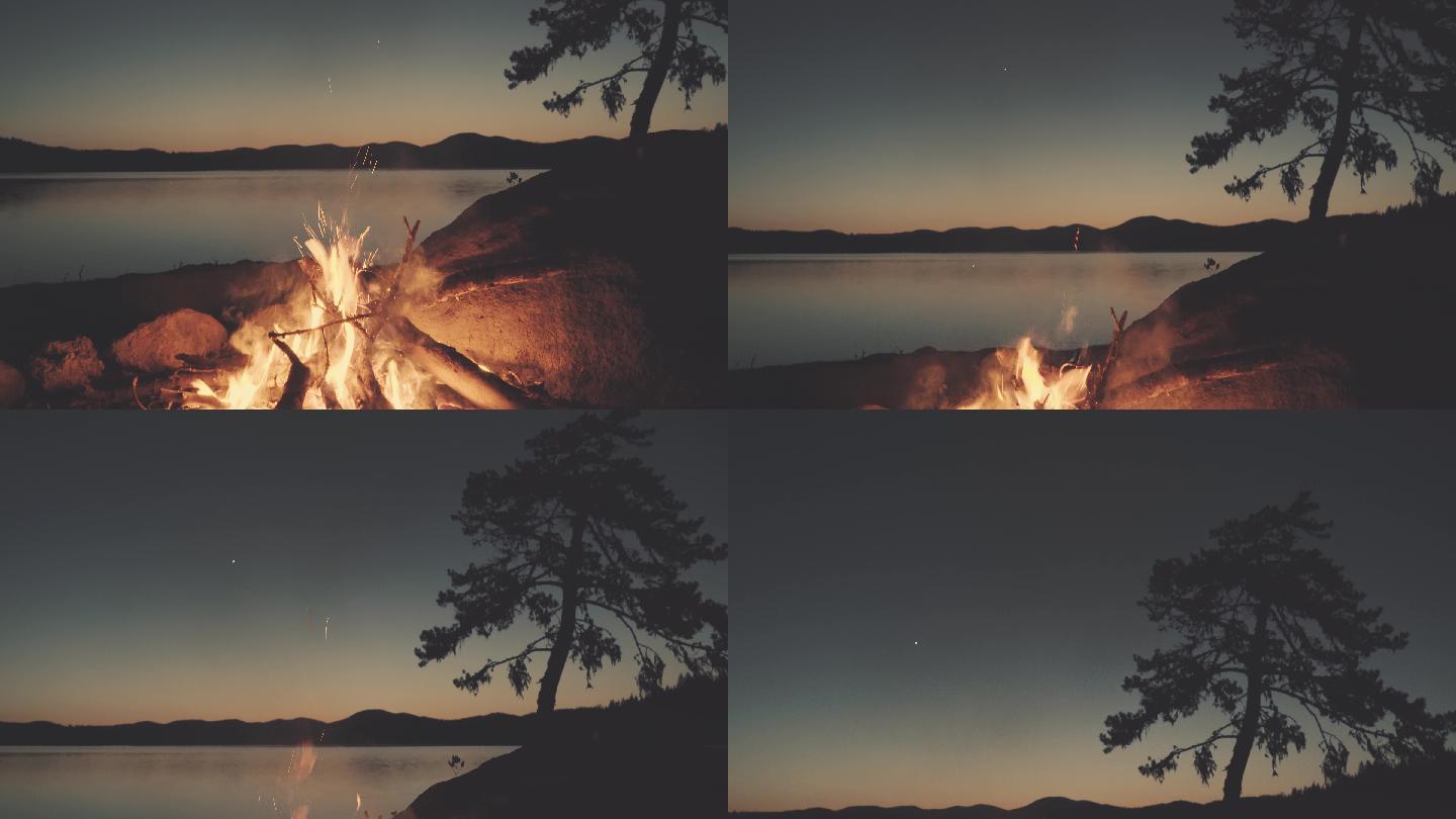 夜间湖岸篝火火堆湖边湖畔野炊生活