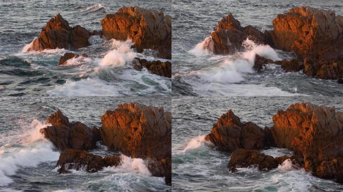 阳光下的海面礁石海边