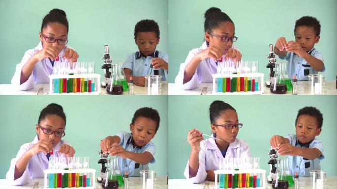 两名儿童测试化学实验室做实验