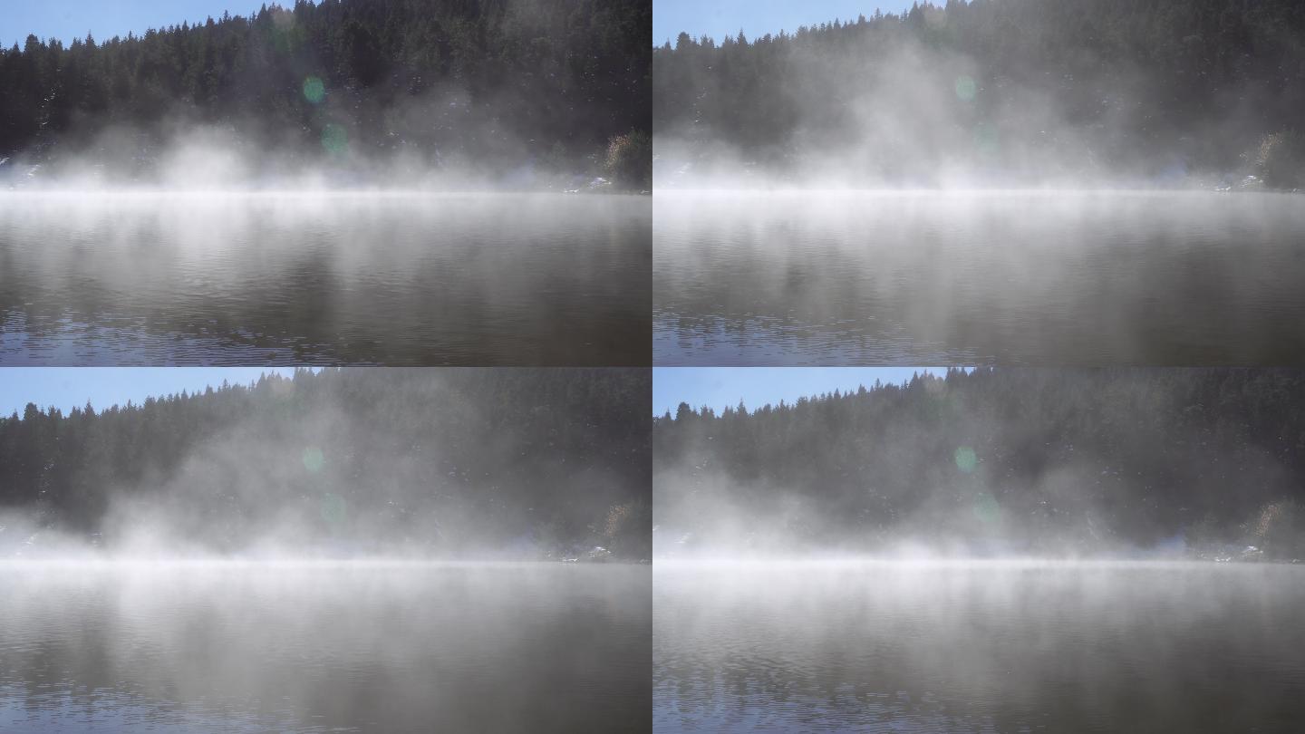 寒冷的秋日里，湖水冒着雾气