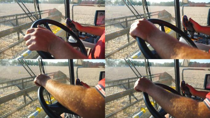农民使用方向盘和操纵杆控制收割机