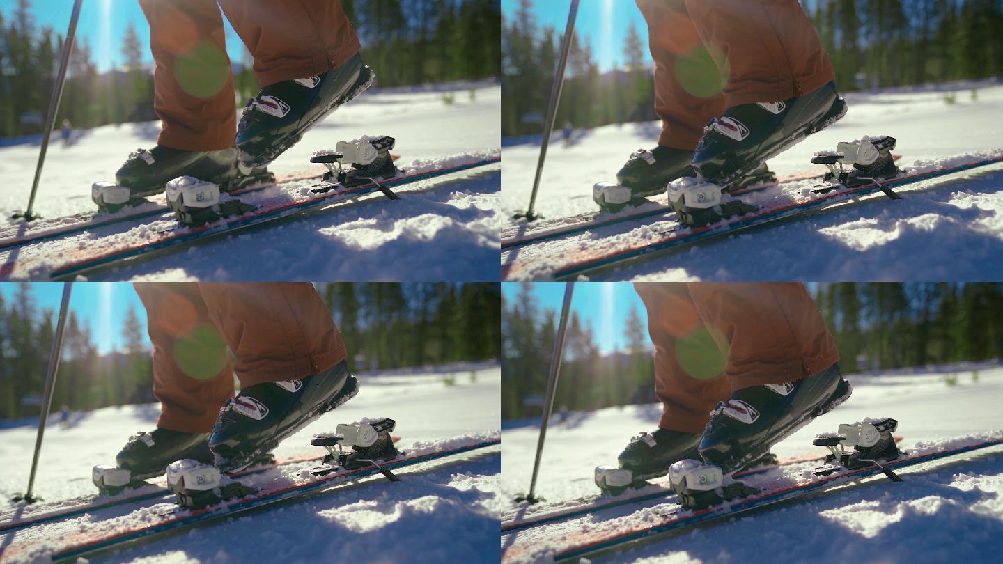 滑雪运动员踏上高山滑雪带的特写镜头