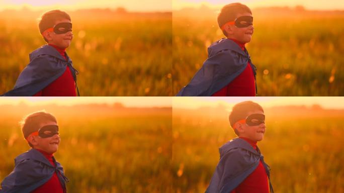 一个男孩在田野里扮演超级英雄