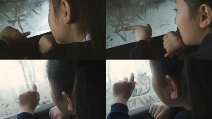 小孩在车内  车窗  车玻璃画画