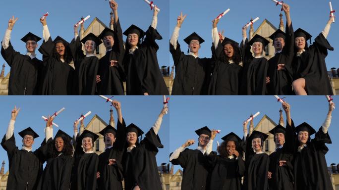 一群快乐的学生在毕业典礼上举起双臂