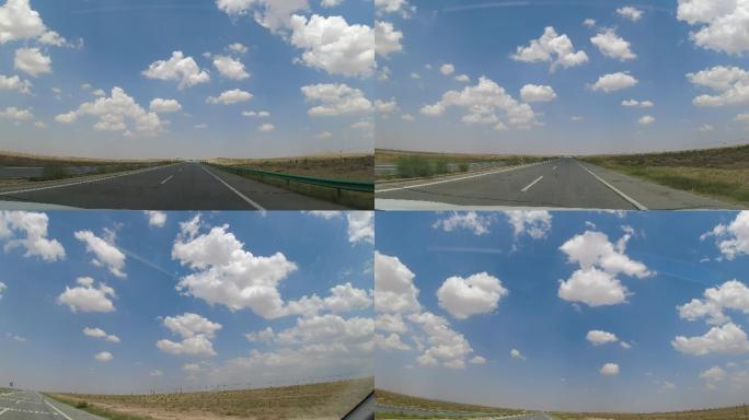 汽车视角平坦的西部公路蓝天白云