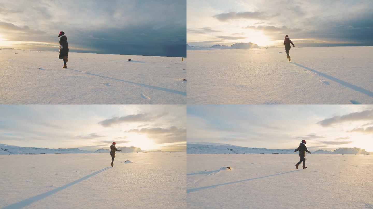 在雪地上奔跑的女人