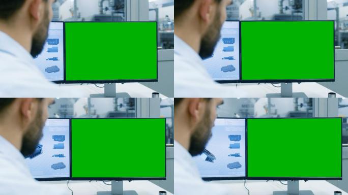 工程师在一台绿色模拟屏幕的电脑上工作