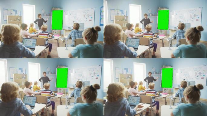 教师使用屏幕交互式数字白板向学生解释课程