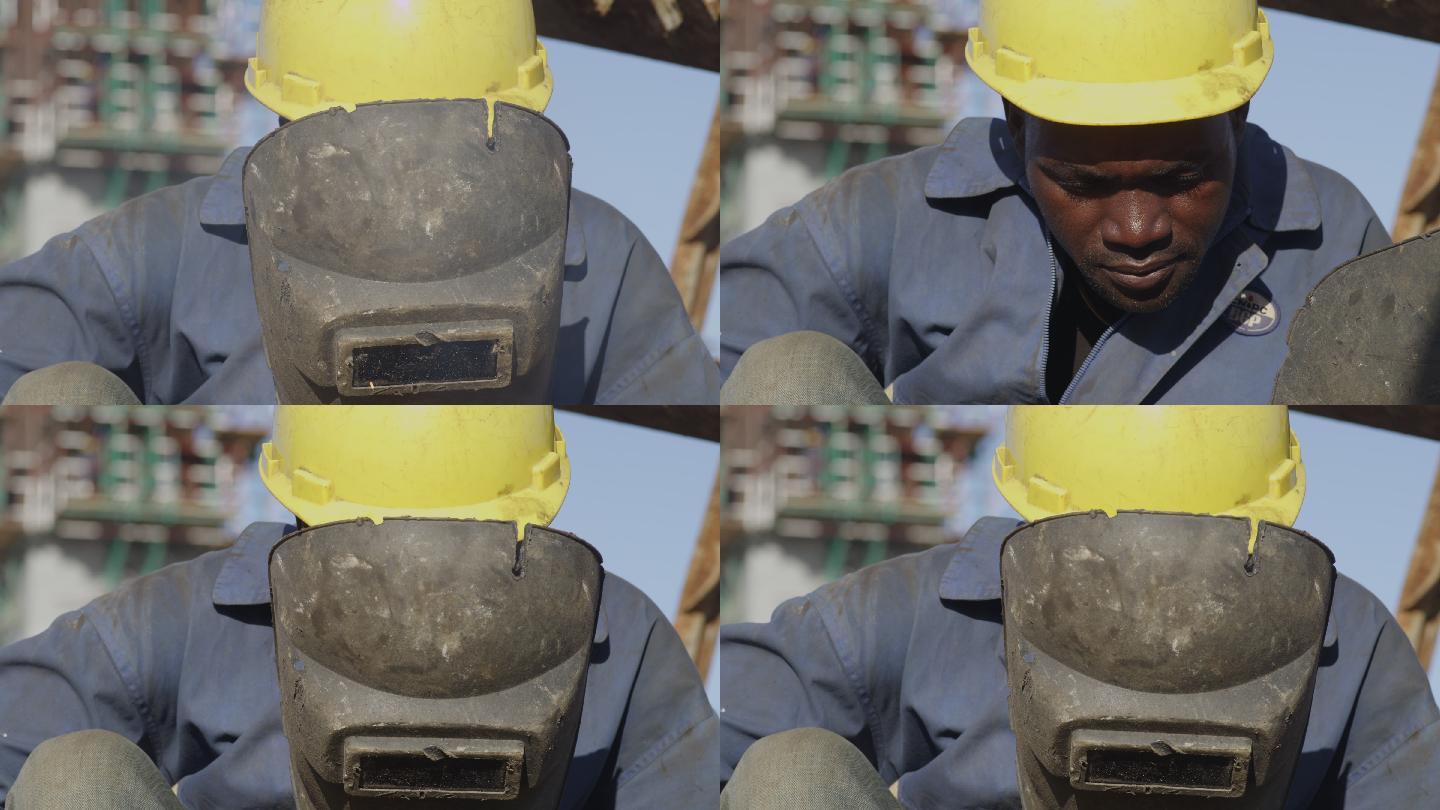 非洲建筑工地电焊工人