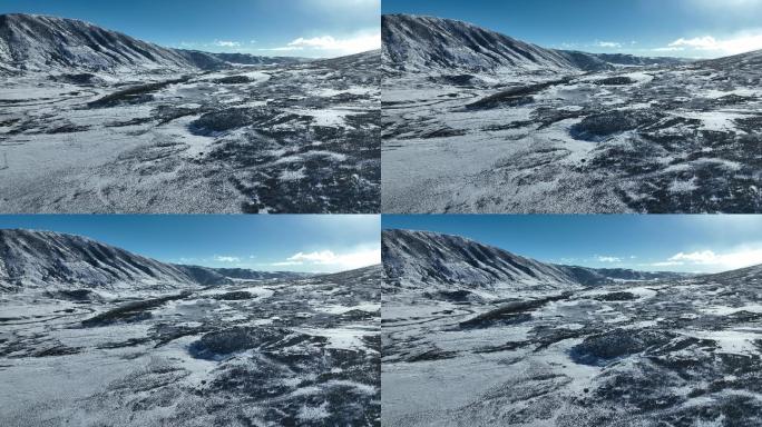 航拍四川理塘高原冬季雪山风光