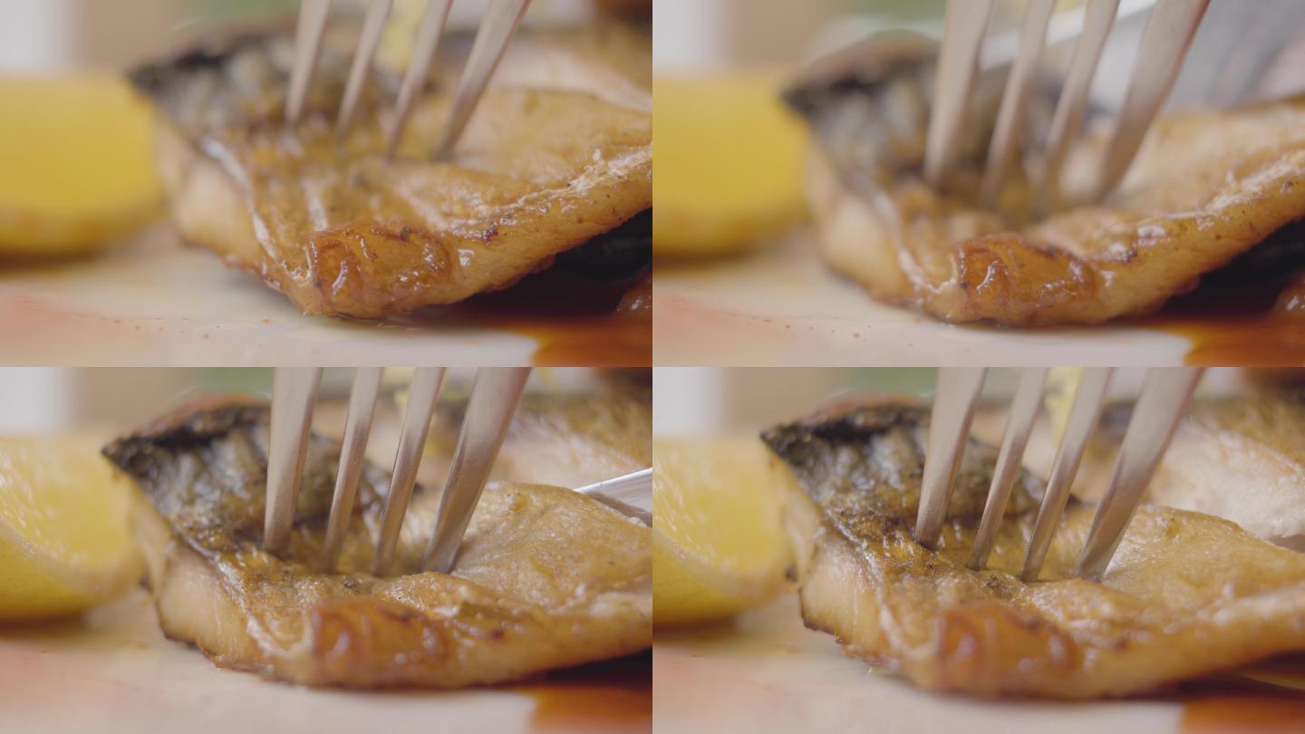 刀切烤鱼特写镜头。