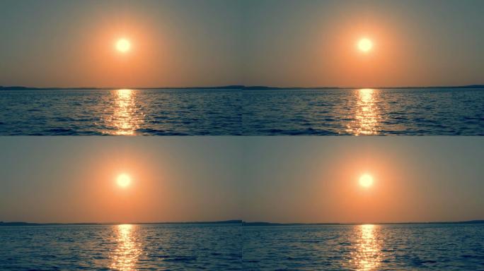 美丽浪漫的日落在海面上