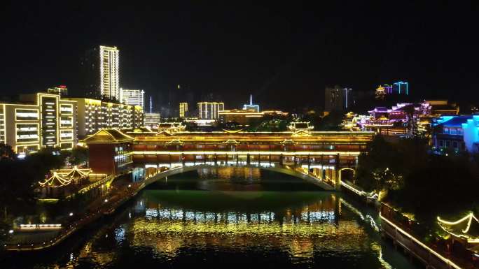 航拍贵州铜仁古城风雨桥夜景灯光