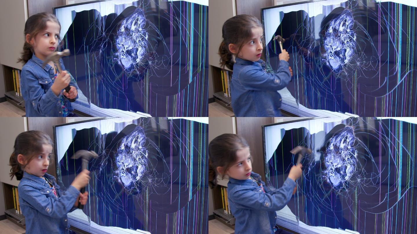 恼怒的女孩用锤子打碎液晶电视屏幕